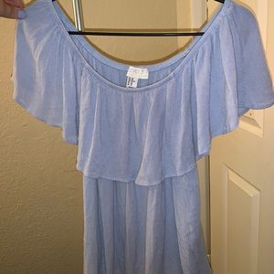 Over the shoulder light blue top